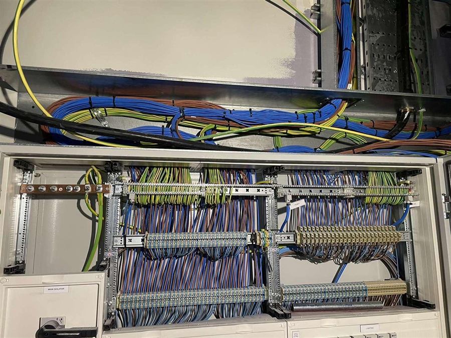 Commercial distribution panel with neatly loomed and terminated wiring