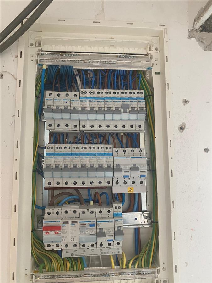 Neatly wired consumer unit with labelled circuits